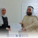 The Dean of AUC Honoured a Student of the Law Dept.